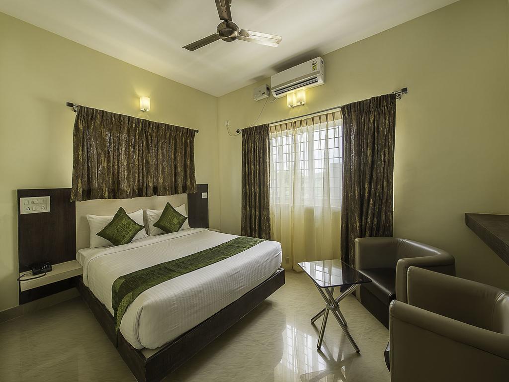 Treebo Trend Daffodil Suites Bangalore Rum bild